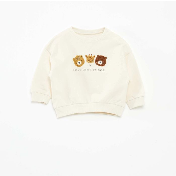 Pull molletonné beige ours