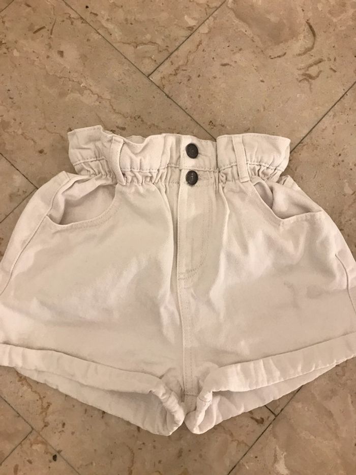 Short court en jeans crème taille 32