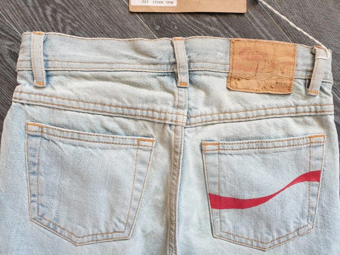 Jean bleu clair fille Coca Cola 8 ans - photo numéro 6