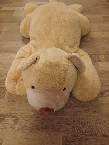 Peluche ours allongé 1 m