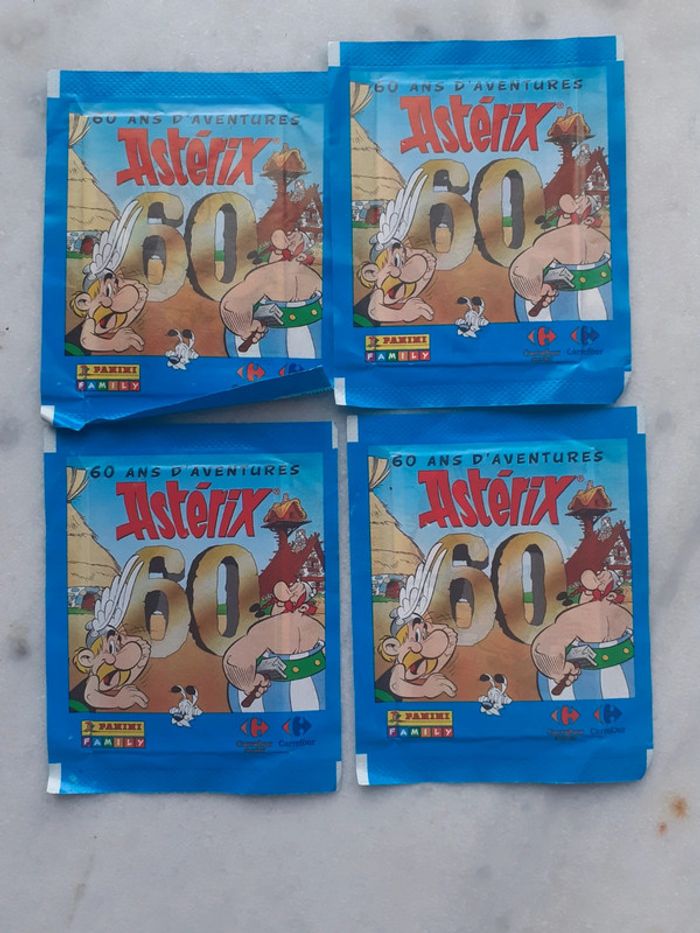 4 pochettes 60 ans d'aventures d'asterix neuves