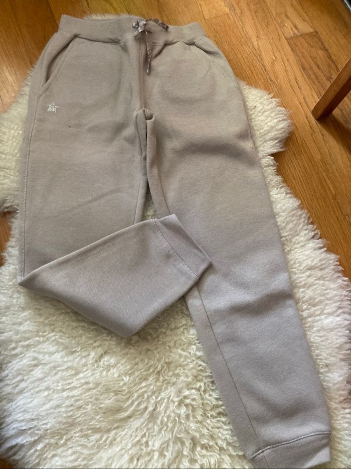 Pantalon, jogging, château de sable huit ans