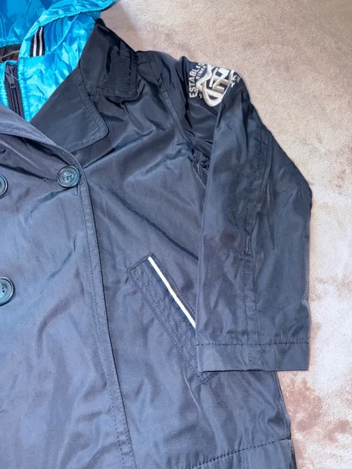 Blouson imperméable garçon catimini taille 6 ans en très bon état. Bleu ciel et bleu marine. - photo numéro 8