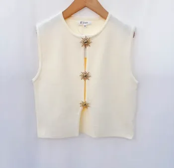 Pull haut sans manches beige étoile laine tendance