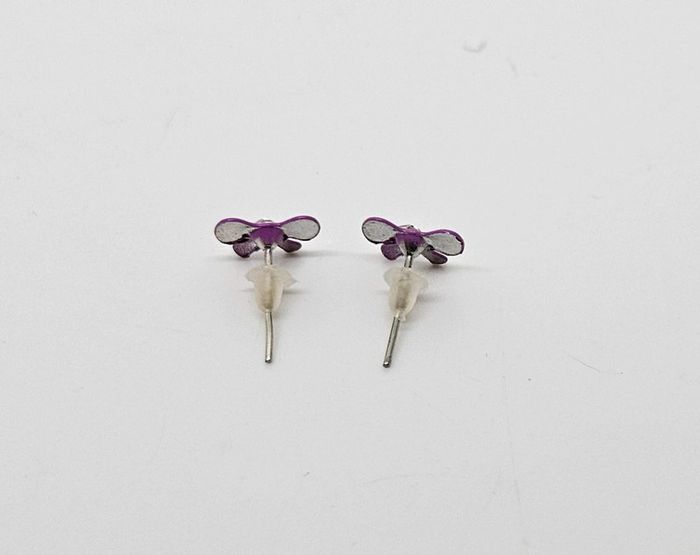 Paire de boucles d'oreilles.
Neuve.
Noeud de papillon - photo numéro 3
