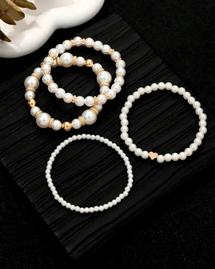 Lot de 4 bracelets perles blanches et or neuf - photo numéro 4