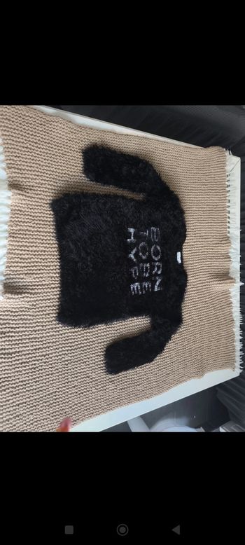 Pull en fausse fourrure noir