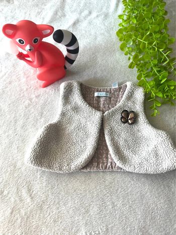 Très beau boléro pour bébé fille