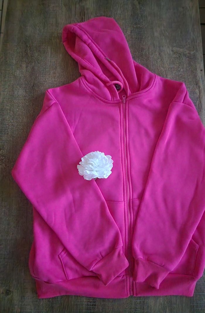 Jolie veste rose