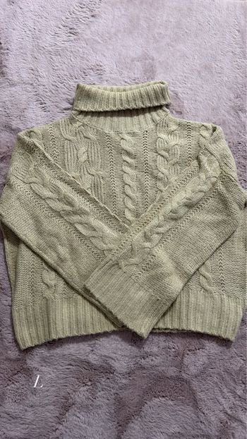 Pull col montant 