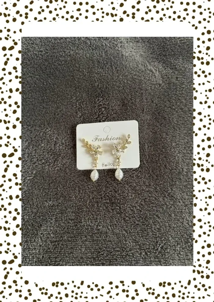 Paire de boucles d’oreilles fleurs
