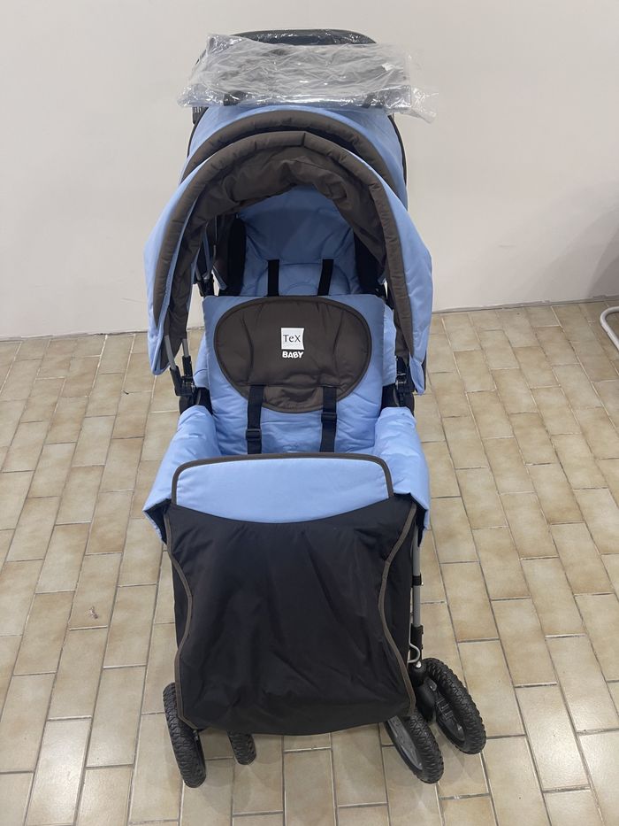 Poussette double NEUVE + housse pluie. Jamais utilisée - photo numéro 8