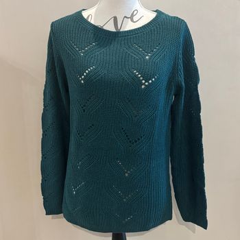 Pull turquoise en côtes perlées