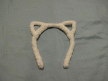 Serre tête chat neuf