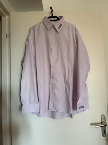 Chemise rose en très bon état taille XL comptoir du rugby