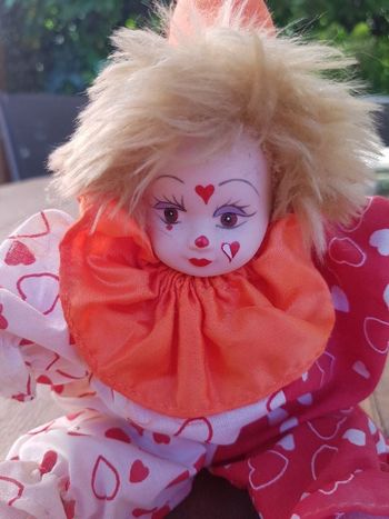 Clown rouge tête porcelaine. 16 cm.