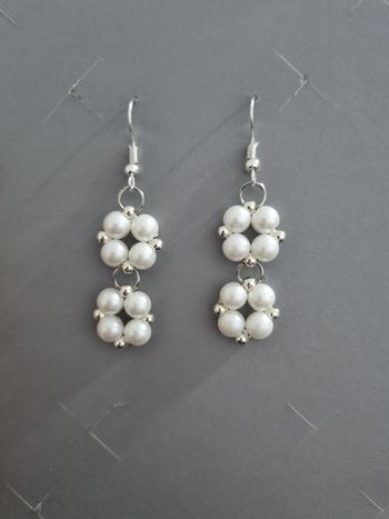 boî d'oreilles perles blanches argentées neuf