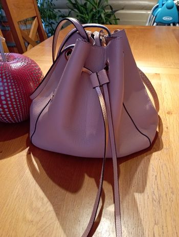 Sac à bandoulière besace rose en parfait état