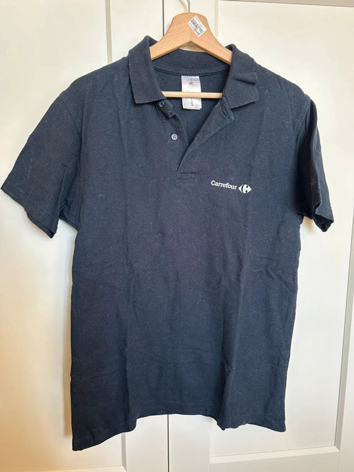 587 – polo bleu marine Carrefour