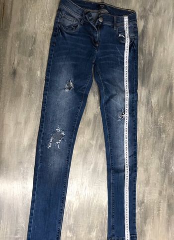 Jeans bleu à trous