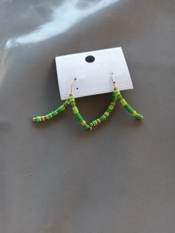 Boucle fantaisie vert doré