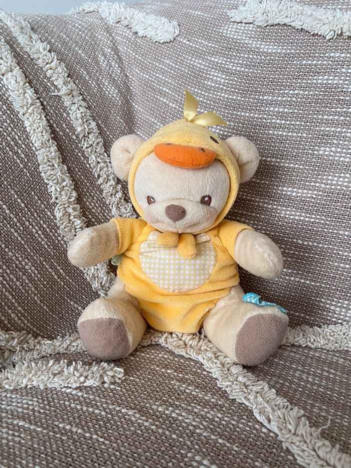 Peluche doudou 20cm fisher price ours jaune et beige à capuche carreau très bon état