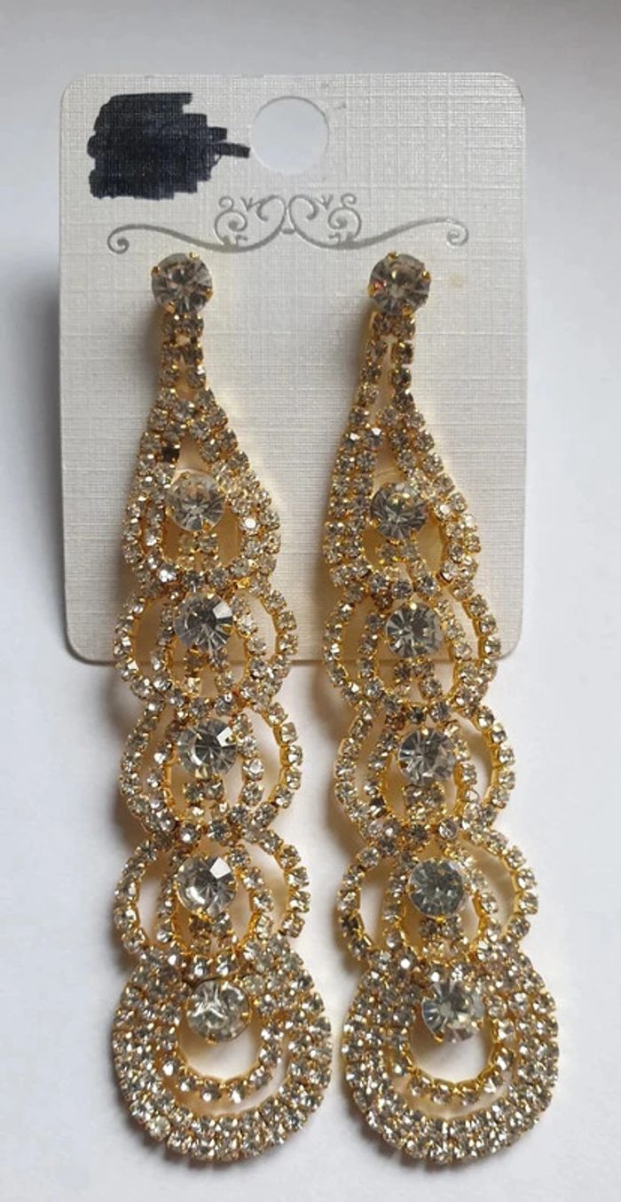 Boucles d'oreilles dorées strass pendantes