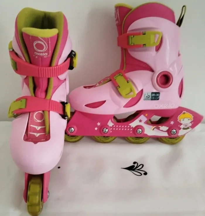 Roller rose évolutif thème princesse en ligne 4 roues Decathlon taille 28-30 - photo numéro 3