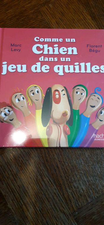 Livre neuf comme un chien dans un jeu de quilles livre mac do