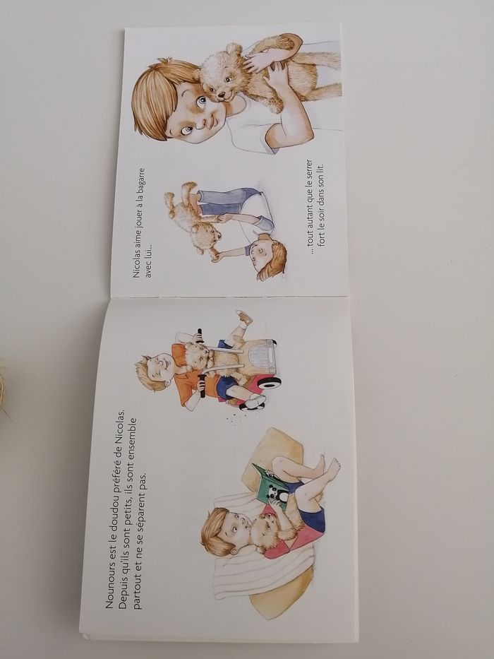 livre et peluche ours - photo numéro 3