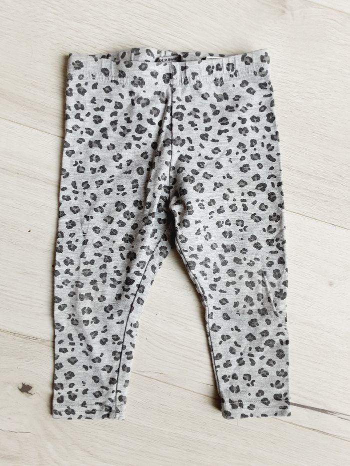 Vêtement bébé fille pantalon legging gris léopard Primark 1 an 12 mois
