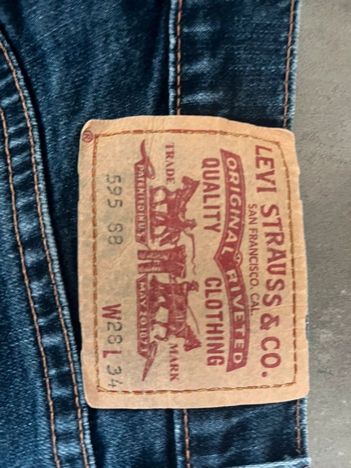 Jeans Lévis bleu brut 595 taille 28x34