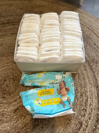 Lots couches Pampers taille 0