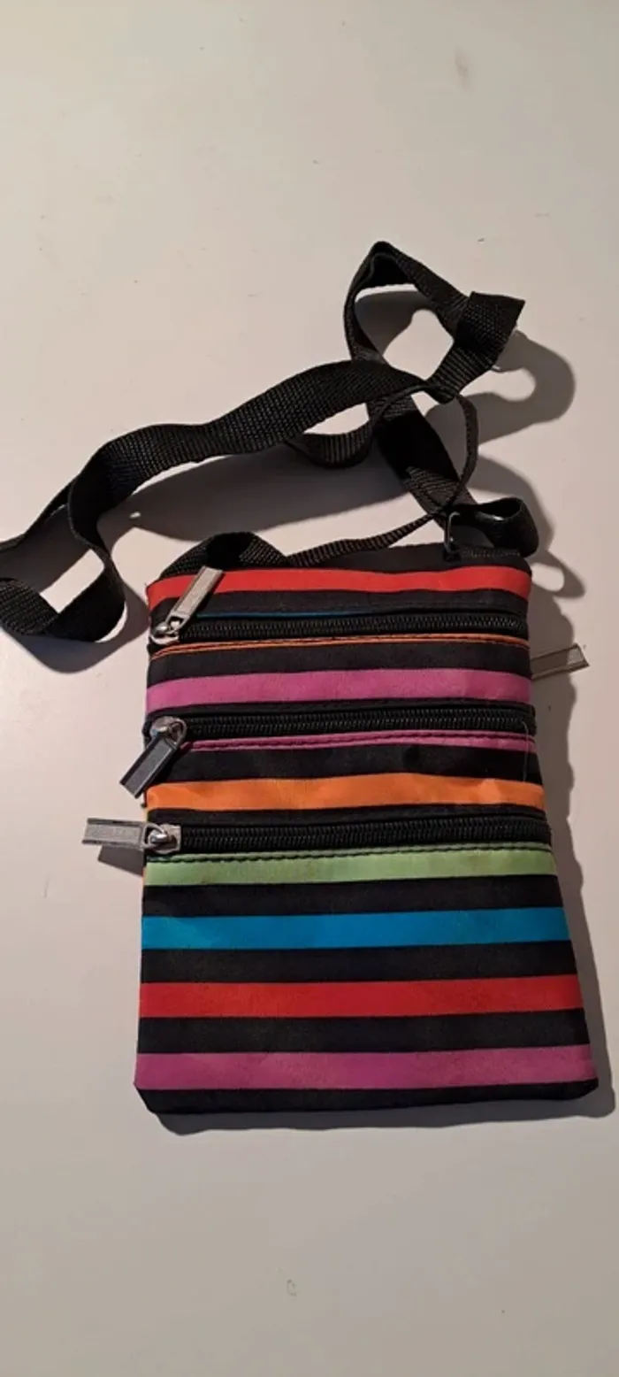 Pochette style Little Marcel - 4 poches - Bon état.