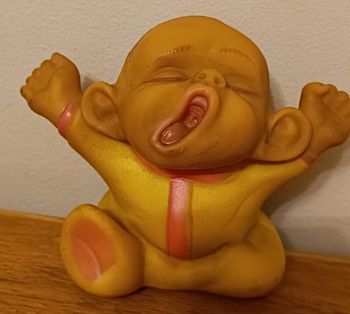 Figurine vinyle jaune signé père