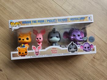 Pack 4 pop winnie l'ourson neuf
Jamais ouvert