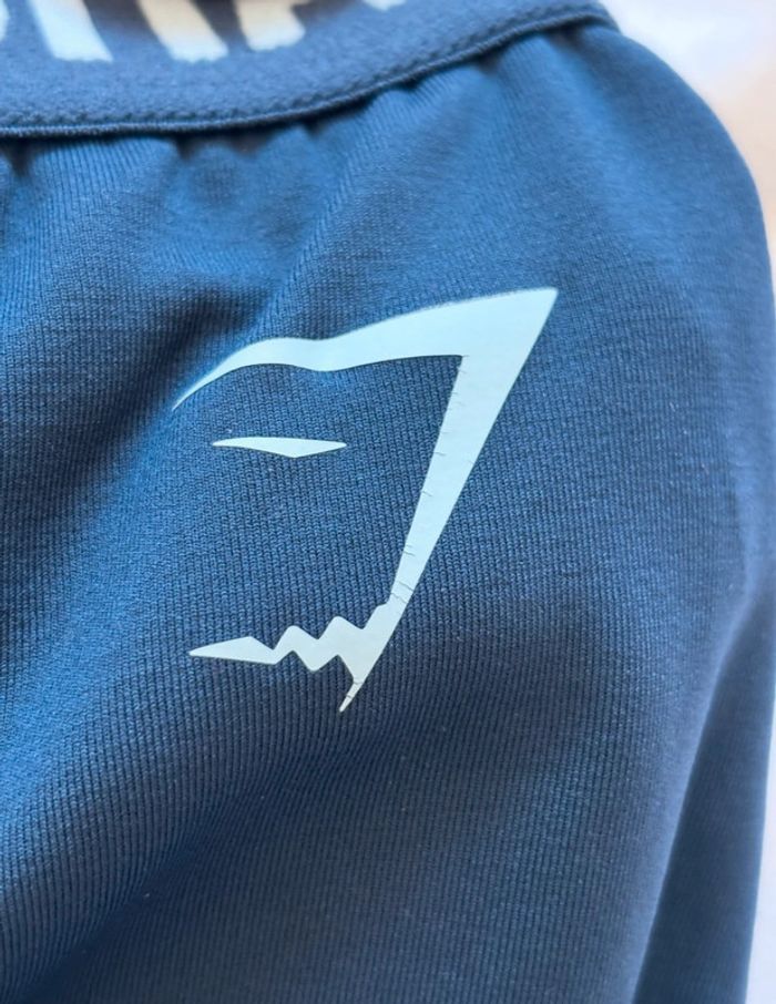 Short Gymshark taille S/36 femme sport fitness bleu marine logo très bon état - photo numéro 4