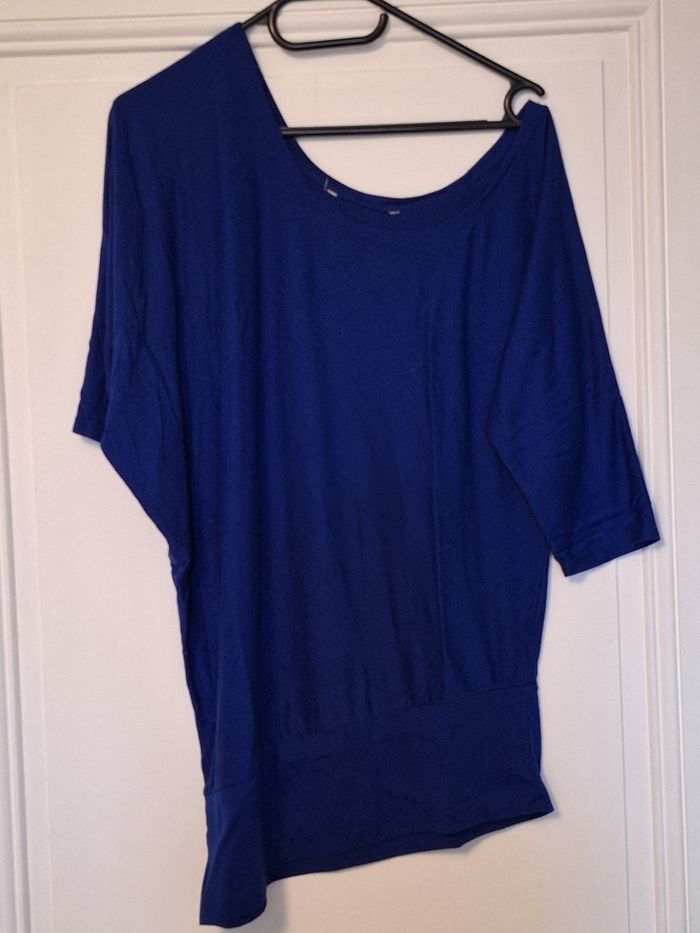 Pull asymétrique manches chauve-souris