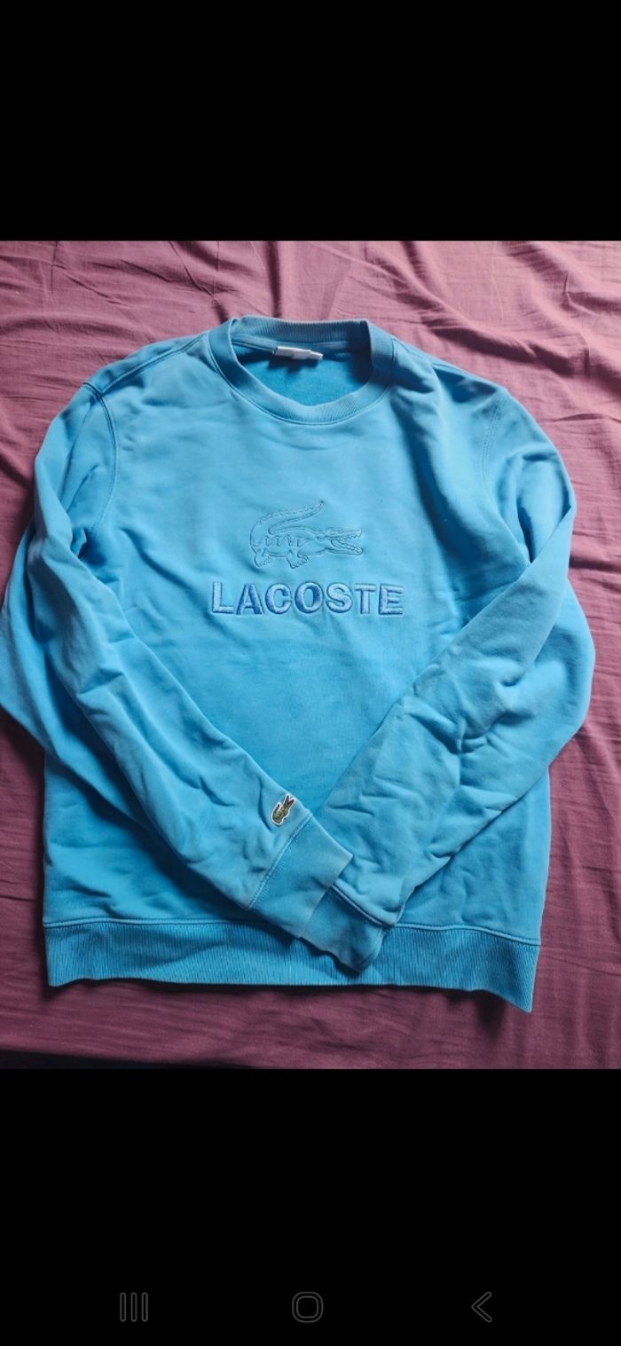 Pull Lacoste bleu taille 4