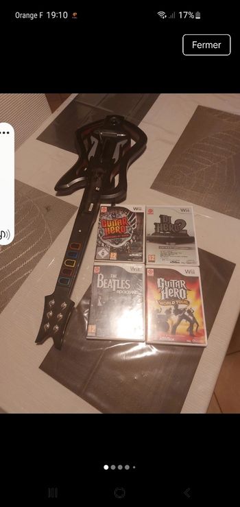 Guitare héros wii et 4 jeux