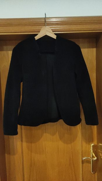 Chaqueta negra como nueva 