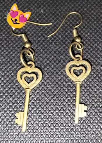 Boucle d'oreille bronze clé 2 coeurs