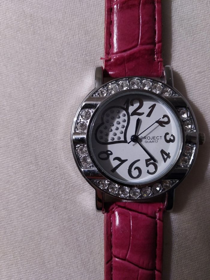 Montre rose - photo numéro 2