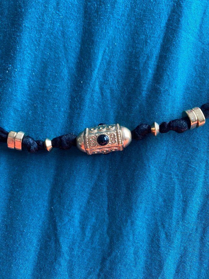 Bracelet doré et noir - photo numéro 3