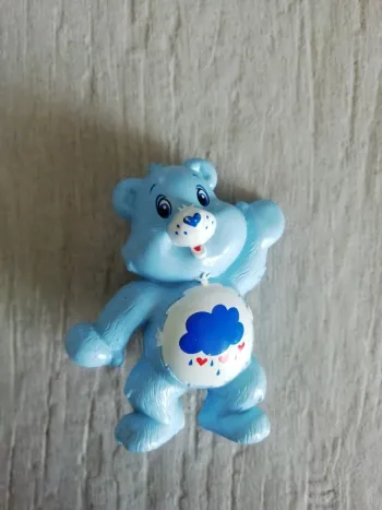 Figurine porte sucette Bisounours touronchon grumpy bear