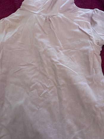 Col roulé rose motifs étoiles 