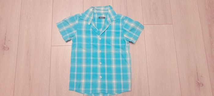 Chemisette bleu turquoise à rayure blanche et jaune. Garçon 7 ans. Marque In Extenso