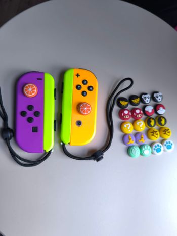 Joycon bluetooth pour Nintendo Switch sans fil -neuf orange violet 