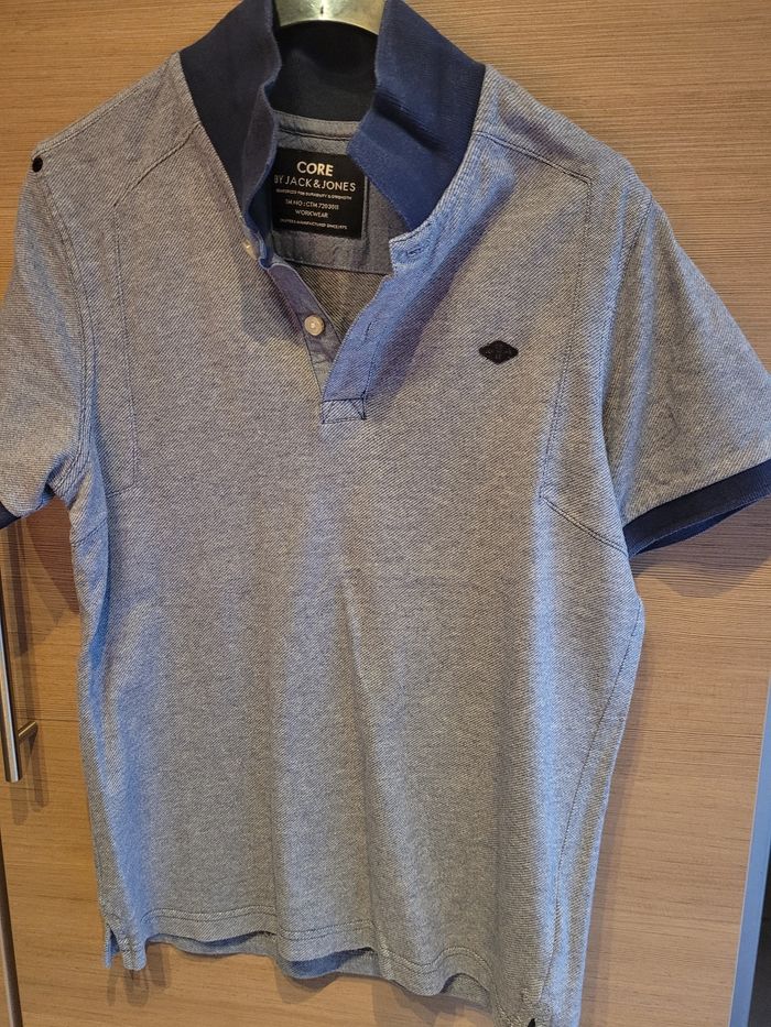 Polo gris chiné bleu marine
