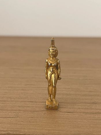 Fève métal doré - Isis